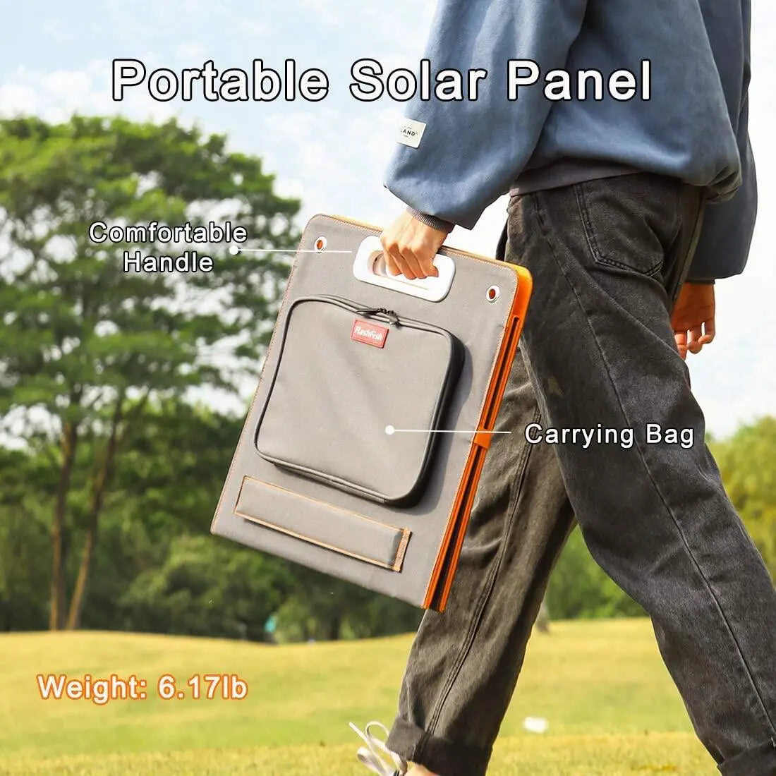 Person carrying a folded FlashFish TSP100 solar panel outdoors